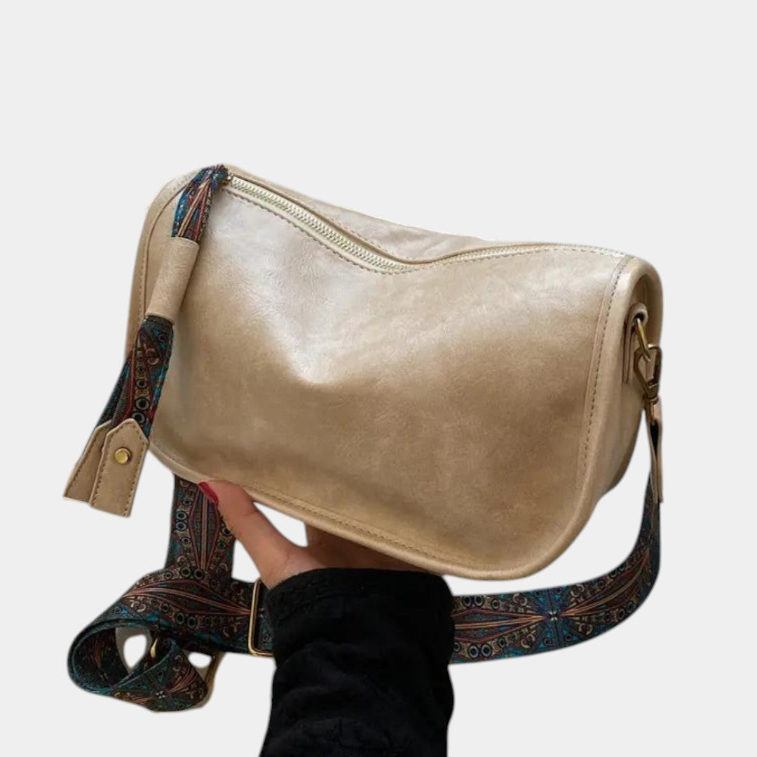 Women’s elegant leather crossbody bag in medium size with structured design, available in black, brown, beige, and green for daily or formal use