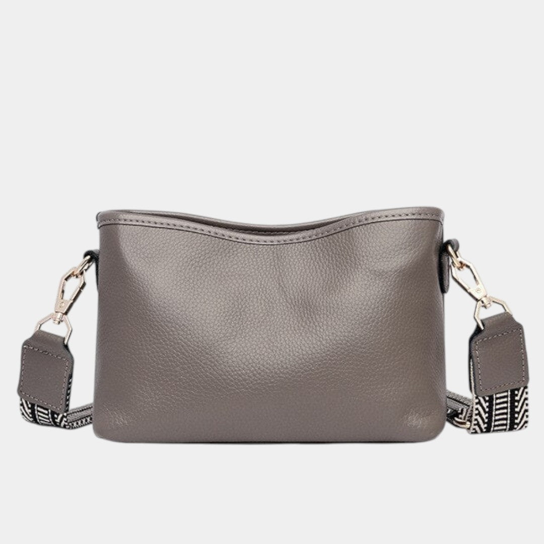 Women’s elegant sling shoulder bag in synthetic leather with adjustable strap and spacious compartments for daily use or travel