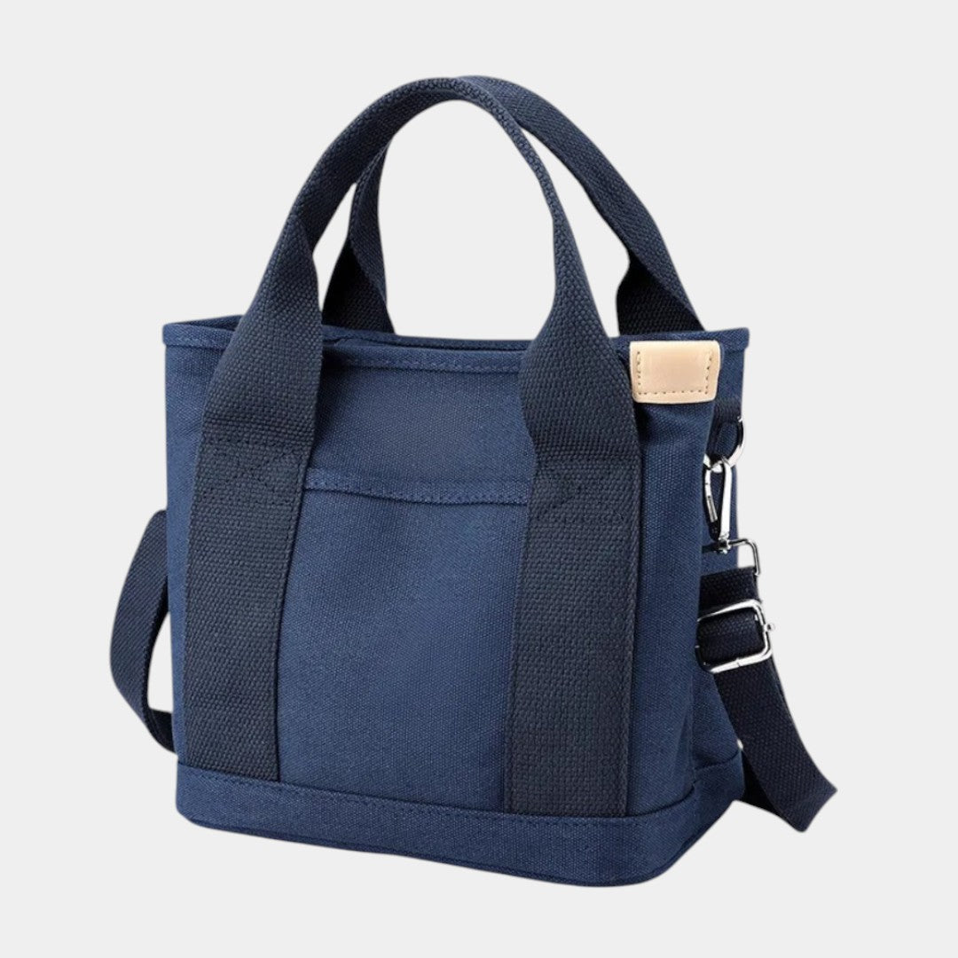 Women’s stylish canvas shoulder bag with adjustable strap and multiple compartments, perfect for everyday use
